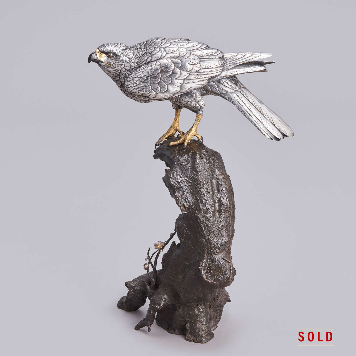 Japanese bronze hawk with silvered body signed Gyōkō Meiji period