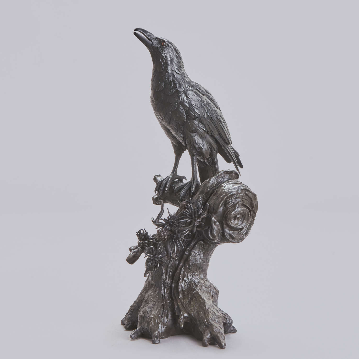 Japanese bronze crow perched on a tree signed Mitani Meiji period