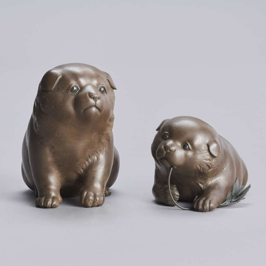 Japanese bronze puppies signed Ryoun Taishō period