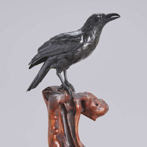 Japanese bronze crow on a wood tree stump signed Mitani, Meiji period
