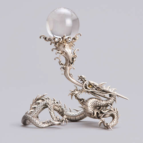 Japanese silvered bronze dragon with the sacred jewel signed Seiryusai Meiji period