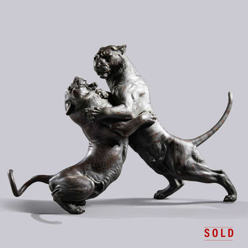 Japanese bronze group of a tiger and a leopard in combat signed Hanehiroya Meiji period