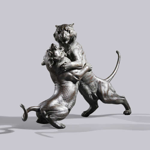 Japanese bronze group of a tiger and a leopard in combat signed Hanehiroya Meiji period