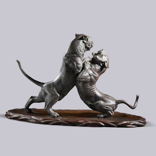 Japanese bronze group of a tiger and a leopard in combat signed Hanehiroya Meiji period