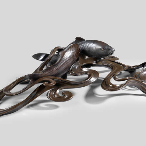 Japanese bronze of koi carps swimming through waves signed Ōshima Joun Meiji period