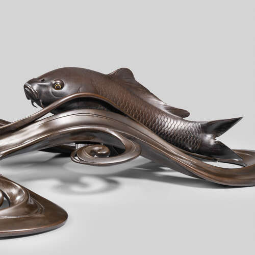 Japanese bronze of koi carps swimming through waves signed Ōshima Joun Meiji period
