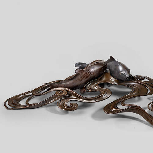 Japanese bronze of koi carps swimming through waves signed Ōshima Joun Meiji period