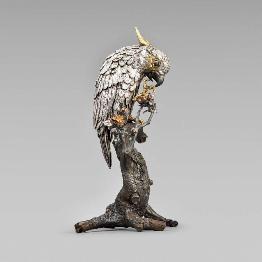 Japanese silver cockatoo signed Suzuki Chōkichi with mark Kiryū Kōshō Kaisha Meiji period