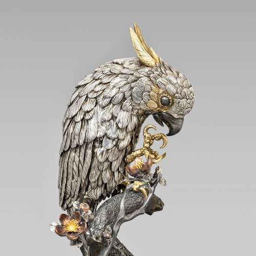 Japanese silver cockatoo signed Suzuki Chōkichi with mark Kiryū Kōshō Kaisha Meiji period